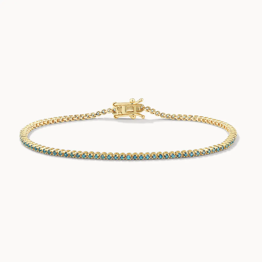 Blue Topaz Tennis Bracelet in 10k Gold