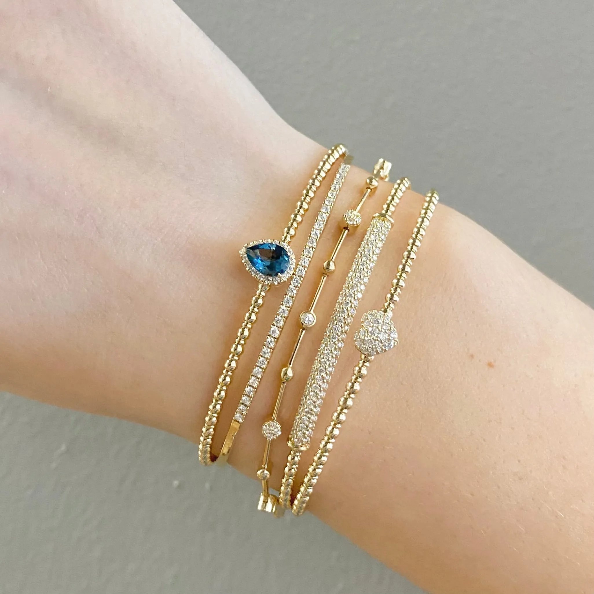 Flexible Blue Topaz & Diamond Halo Bracelet