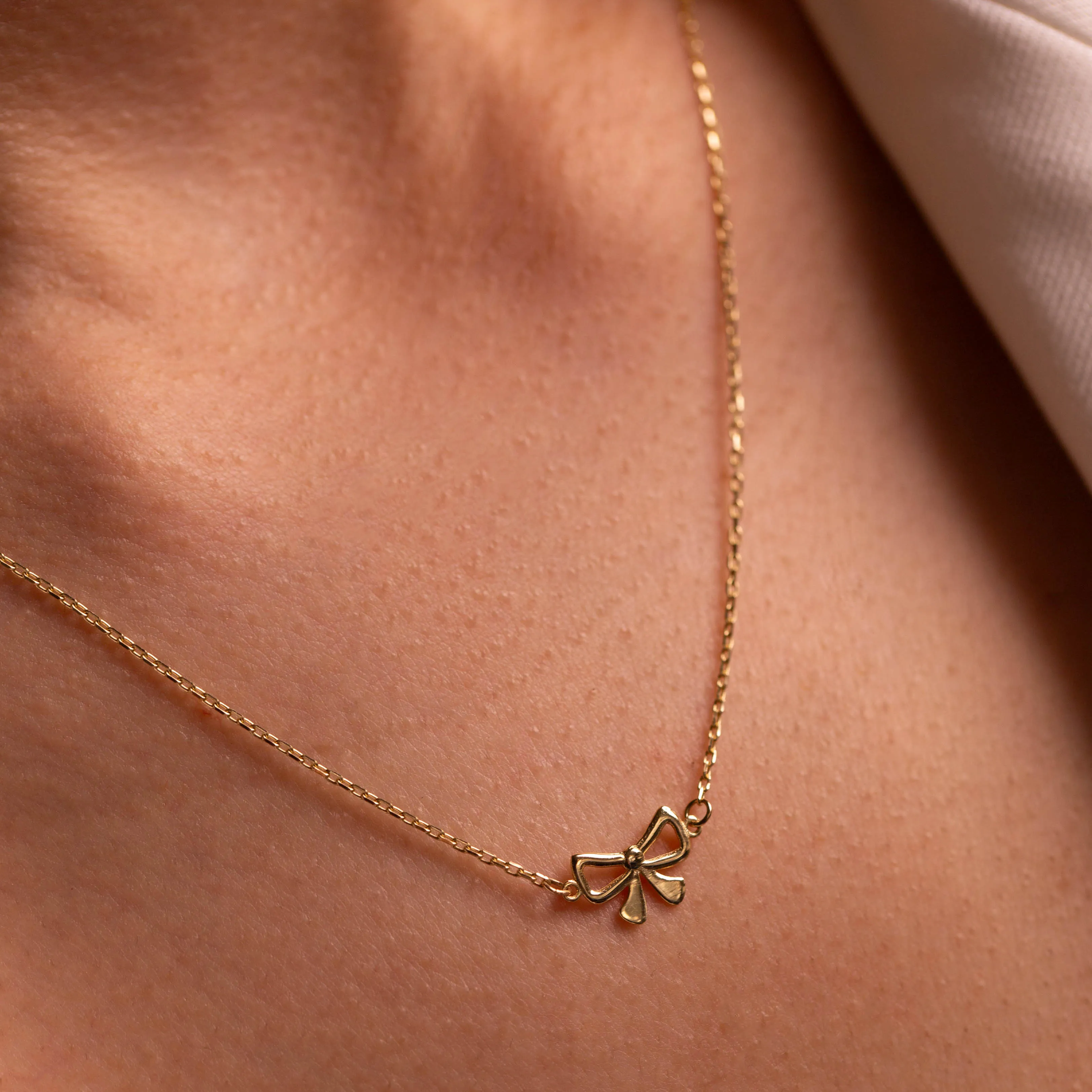 Medley x Dinnara Micro Bow Necklace in 10k Gold