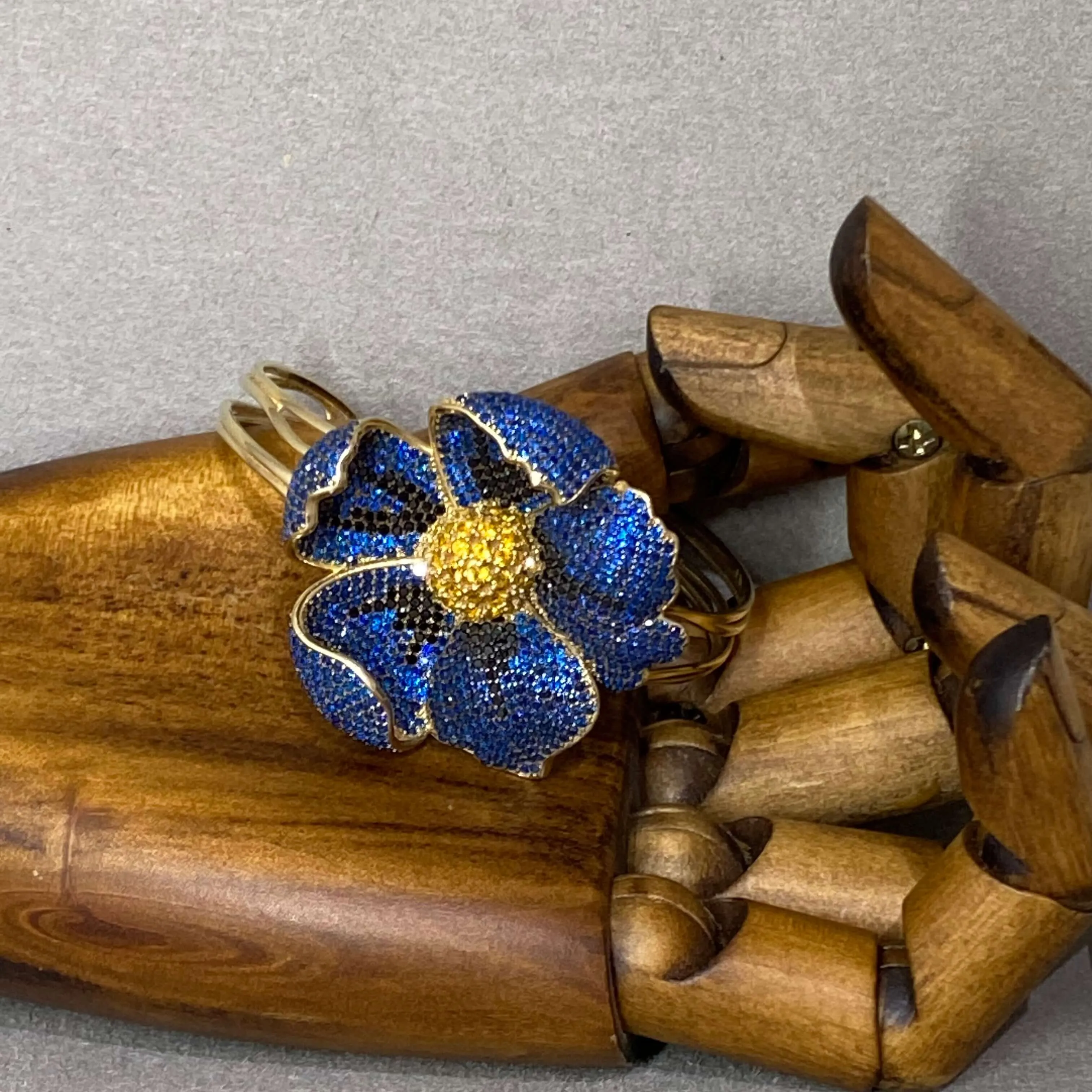 Poppy Flower Cuff Bangle In Sapphire Blue Zirconia