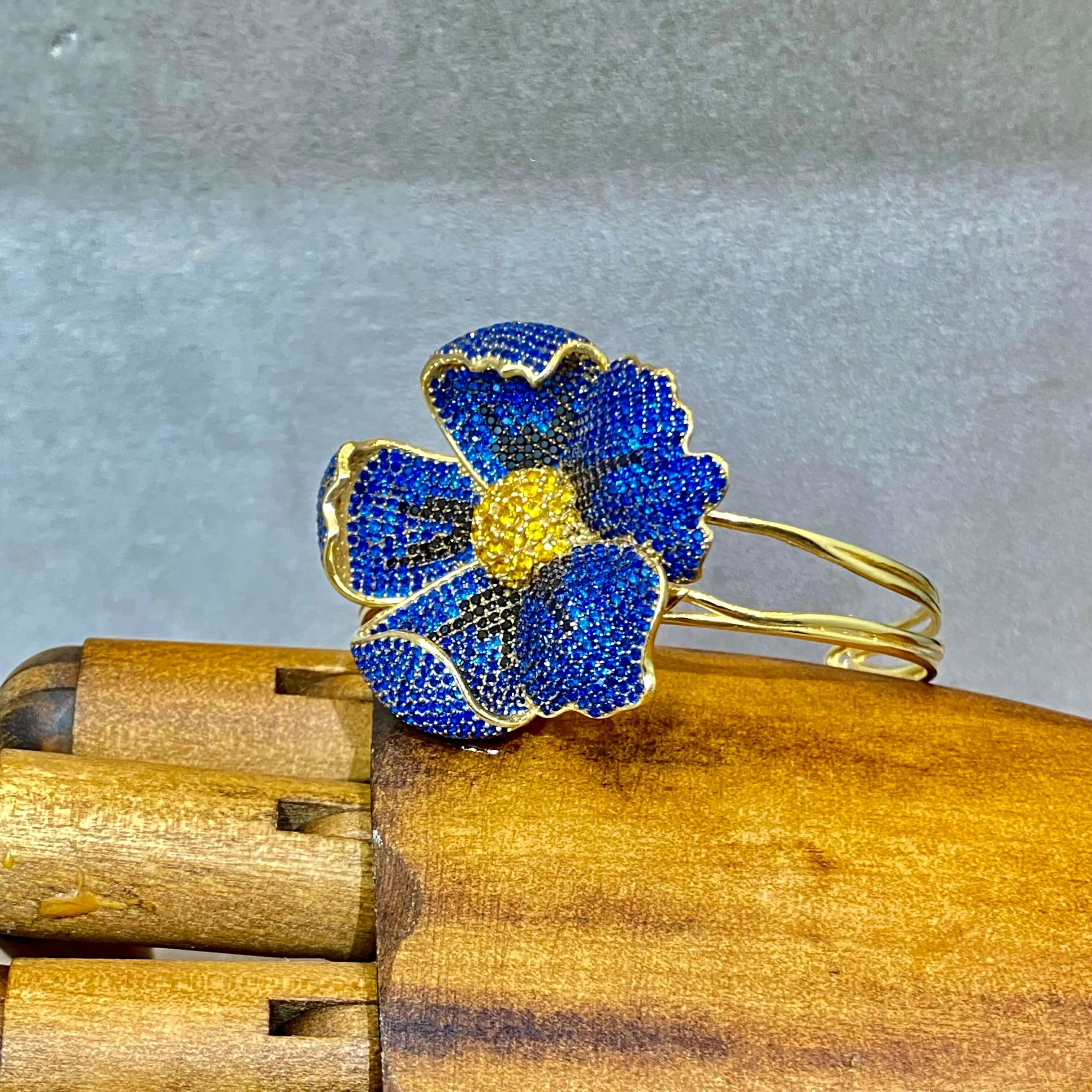 Poppy Flower Cuff Bangle In Sapphire Blue Zirconia