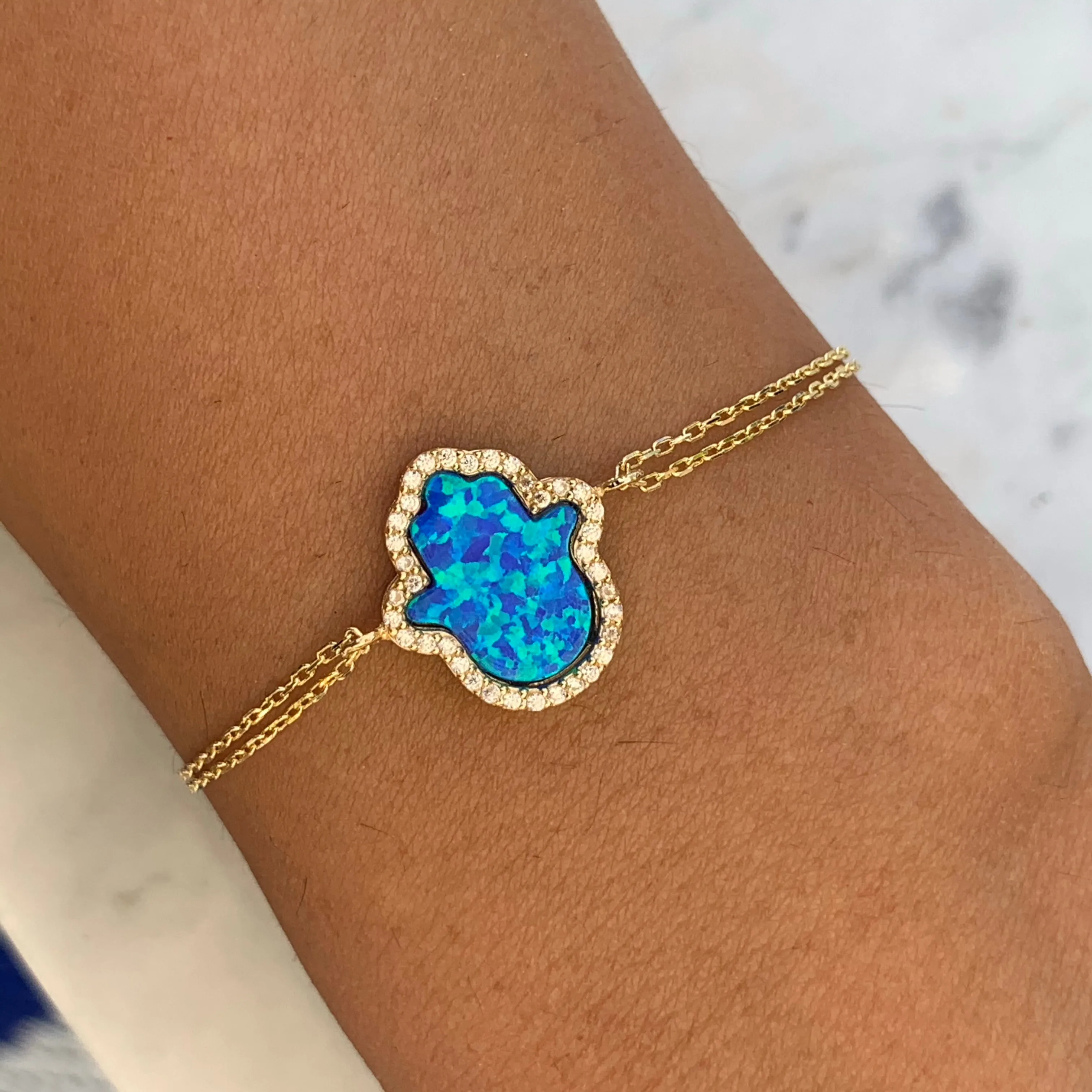 Sterling silver gold plated blue opal hamsa bracelet